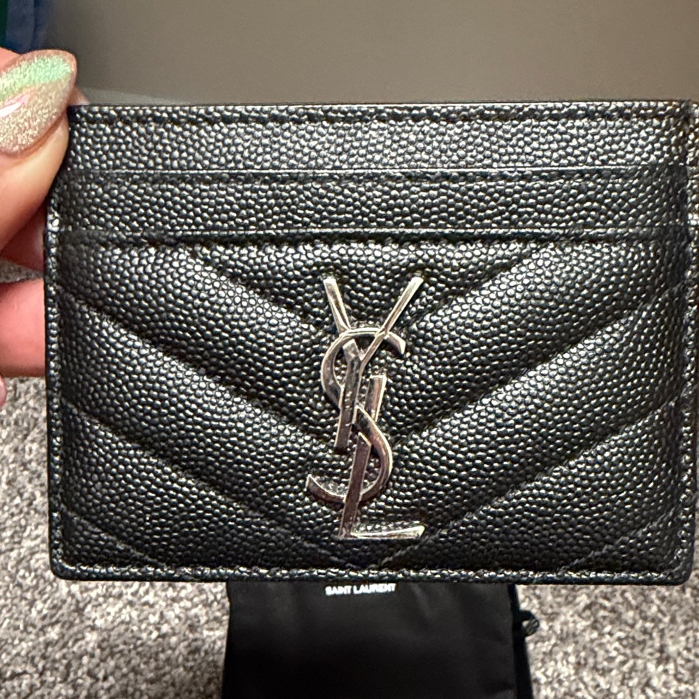 Black YSL card wallet with silver logo